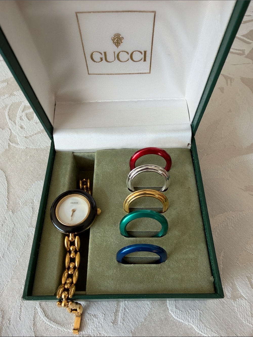 Gucci Gold Bracelet Watch with Black Dial and Multicolor Interchangeable Bezels